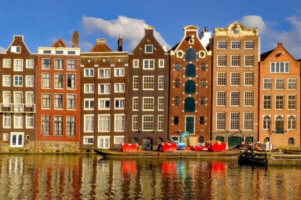AMSTERDAM - Canal houses in sunlight (Pixabay image, no royalty req'd)